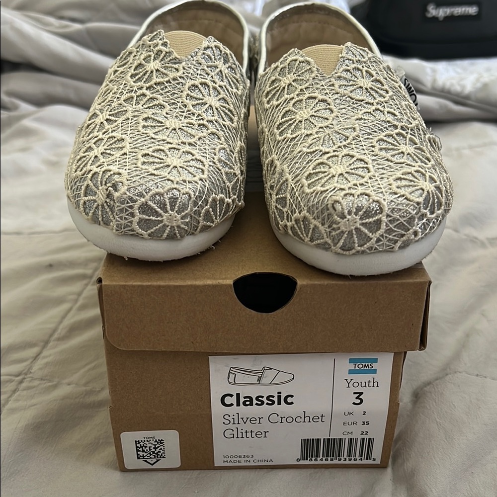 TOMS Youth Silver Crochet Slip-Ons